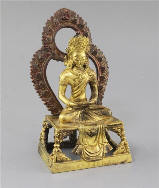 A Chinese gilt bronze seated figure of Amitayus, total height 19cm